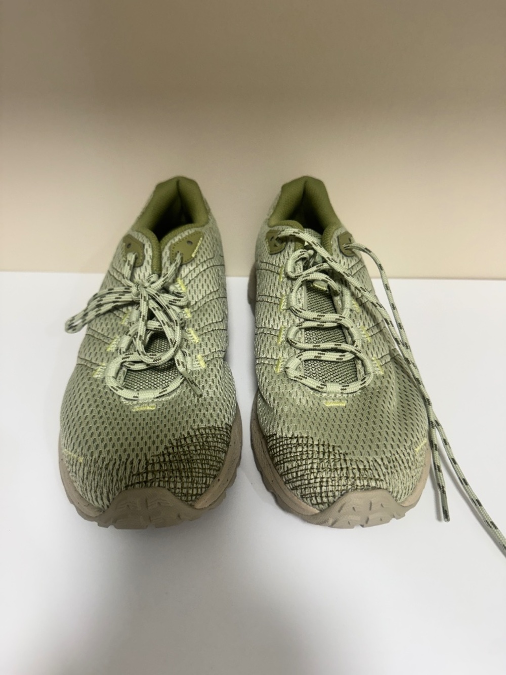 Green Merrell sneakers